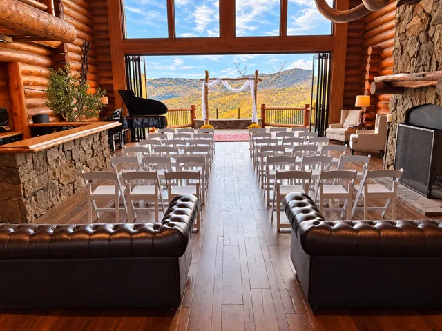 Indoor ceremony with mountain views