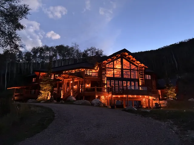 The lodge illuminated at dusk